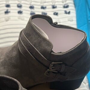 Gray boots, so cute with jeans or skirt. Brand new